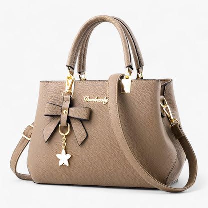 LuxeBella™ – Handtas met Strik en Gouden Accentens